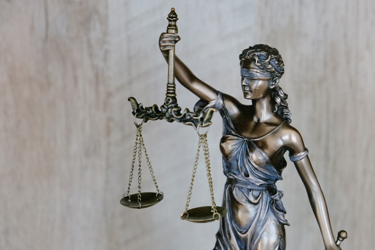 Scales of justice representing the new H-1B weighted lottery system