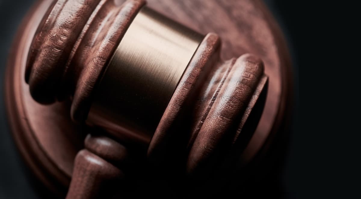 Court gavel representing DOJ criminal records sharing with DHS