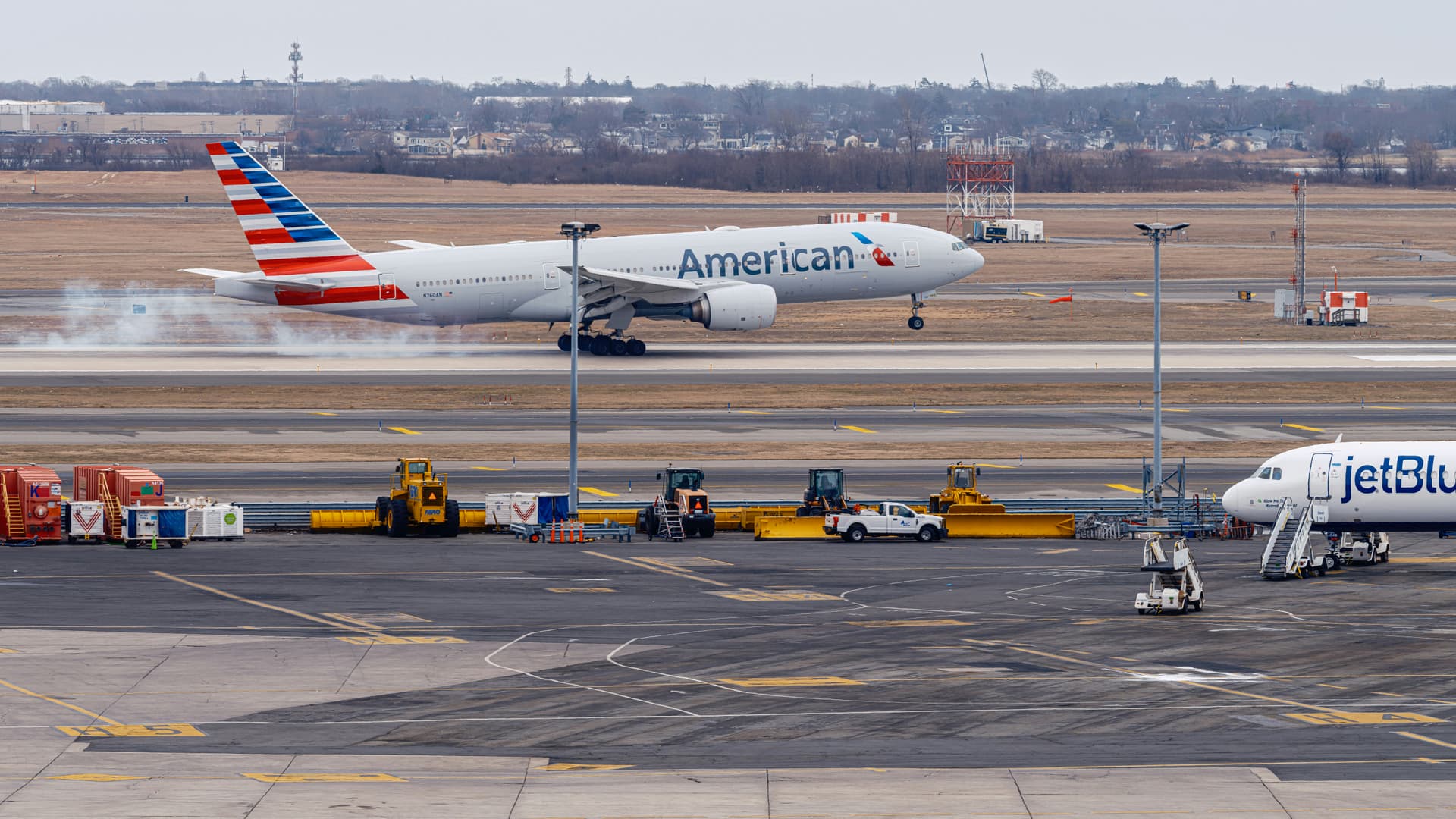 American Airlines aircraft landing on runway — returning to the US