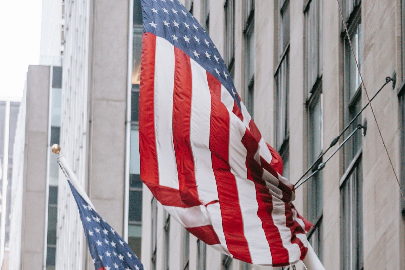 American flags on the facade of a building